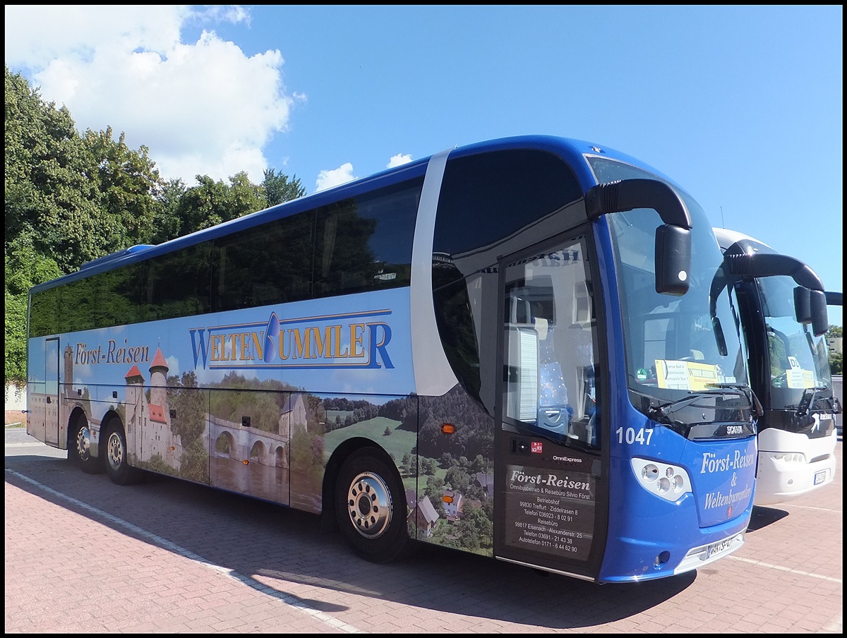 Scania OmniExpress von F�rst-Reisen/Weltenbummler aus Deutschland im Stadthafen Sassnitz.