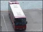 Neoplan Transliner von G�strow-Club-Reisen aus Deutschland im Stadthafen Sassnitz.