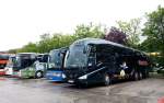 Rechts ein Scania Irizar von Walter Reisen aus �sterreich am 15.Mai 2014 in Krems gesehen.