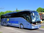 Setra 517 HD von Mitterbauer Reisen aus Nieder�sterreich am 24.4.2015 in Krems unterwegs.