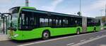 MB Citaro (2077) von RHOEN-ENERGIE steht im Juli 2023 am H�nfelder Bahnhof