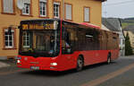 MAN Lion`s City rollt als Linienbus durch Maring-Noviand im Oktober 2022