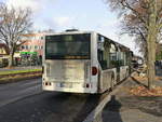 Daimler Bus der OBE Oberhavel Bus Express GmbH, Oranienburg steht an der Strecke der NEB - Die Niederbarnimer Eisenbahn in Berlin Rudow in der Stubenrauchstra�e.