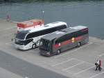Neoplan Cityliner von Rose Reisen aus Deutschland und Mercedes Travego von Herol� aus Deutschland im Stadthafen Sassnitz