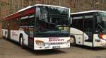 Dieser Setra S415 NF von Trischan Reisen war am 23.02.2014 w�hrend eines Bundesligaspiels des 1.FC Kaiserslautern auf einem Parkplatz abgestellt.